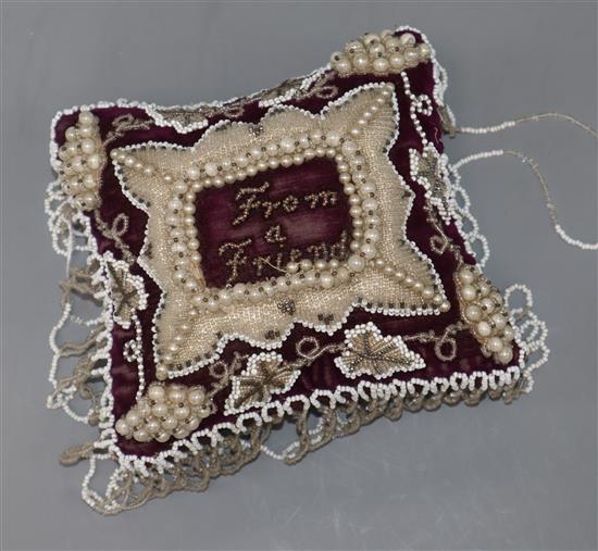 A Victorian velvet and beadwork From a Friend cushion